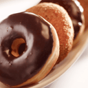 Foto de Donas bañadas en Chocolate rellenas con Dulce de Leche