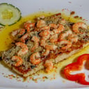 Foto de Robalo en salsa de camarones al ajillo