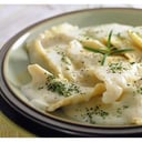 Foto de Ravioles Rellenos en Salsa Blanca con Champiñones