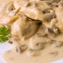 Foto de Pollo en salsa champiñones