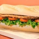 Foto de sandwich  suprema con papas fritas