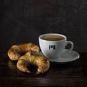 Foto de Cafe con Leche + 2 panificaciones