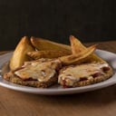 Foto de Milanesa a la Napolitana c/ papas rusticas