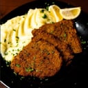 Foto de Milanesa de peceto con puré