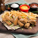 Foto de Deditos de pollo con papas fritas