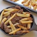 Foto de Papas fritas con carne