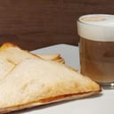 Foto de Cafe + tostado de miga / coffee + toasted ham and cheese with crumb bread
