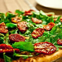 Foto de Rúcula y tomates secos