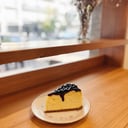 Foto de Cheesecake con frutos rojos (porción)