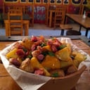Foto de PAPAS RUSTICAS CHEDDAR, VERDEO Y PANCETA