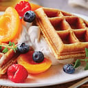 Foto de Waffles con fresa, plátano, manzana, miel y granola (3 pzas)