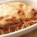 Foto de Spaguetti en salsa pomodoro con pollo a la parmesana