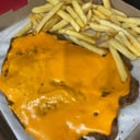 Foto de Milanesa con cheddar + guarnición