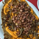 Foto de Milanesa con cheddar y panceta + guarnición