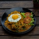 Foto de Tigrillo con seco de pollo o carne