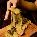 Foto de Pita gouda con pesto.