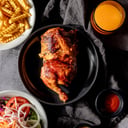 Foto de 1/2 pollo + papas + ensalada 