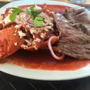 Foto de Chilaquiles con carne asada a la plancha.