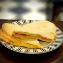 Foto de Tostado en Pan Árabe de Jamón y Queso