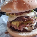 Foto de De la calle  1/4 lb. (papa cabello de ángel, jamón y piña)