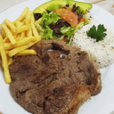 Foto de CHURRASCO CON PAPAS CROCANTES, ARROZ Y ENSALADA DE PALTA