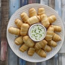 Foto de 12 MINI TEQUEÑOS DE 4CM CON SALSA