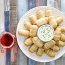 Foto de 24 MINI TEQUEÑOS DE QUESO CON SALSA