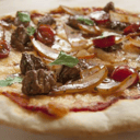 Foto de PIZZA DE LOMO SALTADO