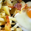 Foto de Papas fritas con dos (2) huevos