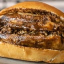 Foto de La torta de tamal de Mole con Pollo