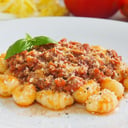Foto de Ñoquis con salsa Boloñesa
