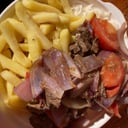 Foto de Lomo saltado + porción arroz y papas fritas