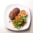 Foto de Bife de chorizo con reducción de malbec y salsa criolla