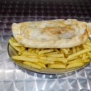 Foto de Calzone de Jamón y queso con Guarnición