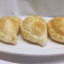 Foto de Empanada de carne con pasas