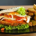 Foto de Milanesa canadiense con guarnición