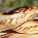 Foto de Empanada de carne cortada a cuchillo