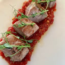 Foto de Dados de Atún Rojo con nuestro Tomate confitado y Piñones