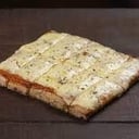Foto de Porcion de pizza con muzza