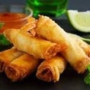 Foto de una docena arrolladitos + una salsa a elección 