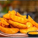 Foto de Gajos de Papa con queso cheddar