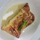 Foto de Torrija Caramelizada con salsa de azahar y chocolate blanco