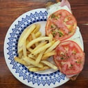 Foto de Milanesa napolitana con guarnición 