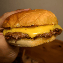 Foto de hamburguesa simple con cheddar