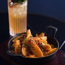 Foto de Papas con cheddar y tocino