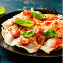 Foto de RAVIOLES DE LOMO CON SALSA BOLOGNESA
