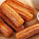 Foto de CHURROS ESPECIALIDAD ESPAÑOLA (rellenos de majar)