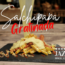 Foto de Salchipapa gratinada