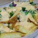 Foto de Fritas con CHEDDAR y VERDEO