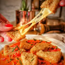 Foto de Muzzarellas rebozadas crocantes con salsa filetto